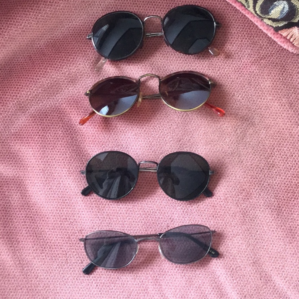 4 pair of sunglasses